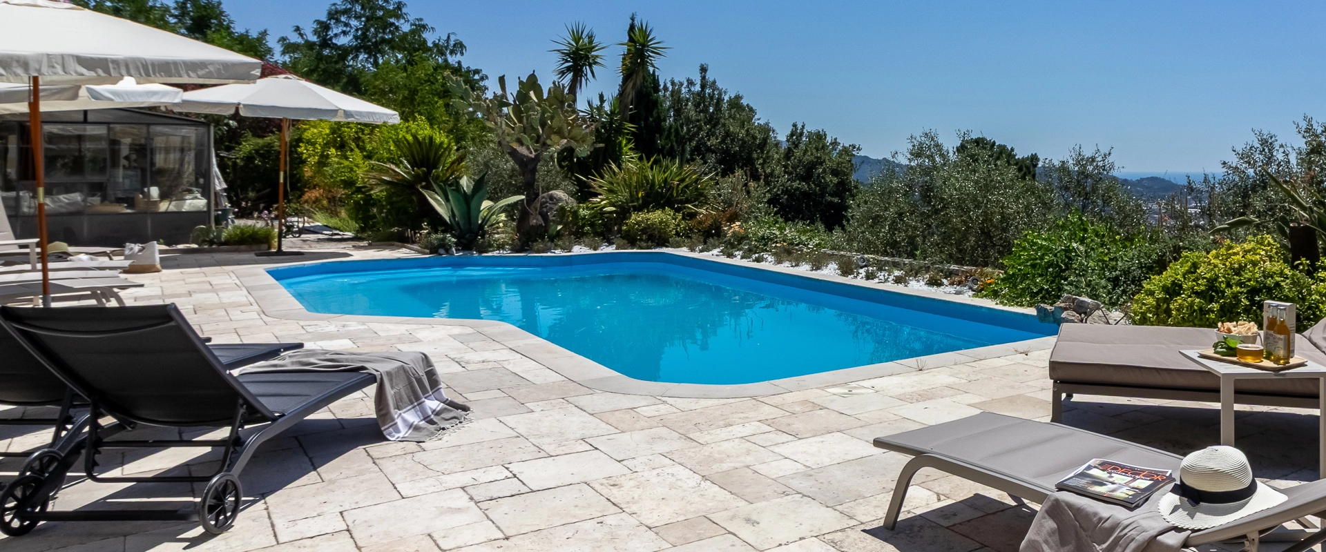 Swimming pool and terrace at Villa Amaranta Liguria