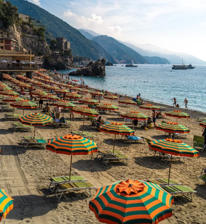 Monterosso beach in Cinque Terre with colourful umbrellas